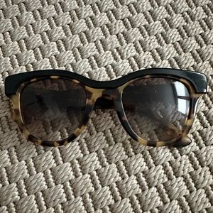 PRADA Women’s tortoise and black sunglasses